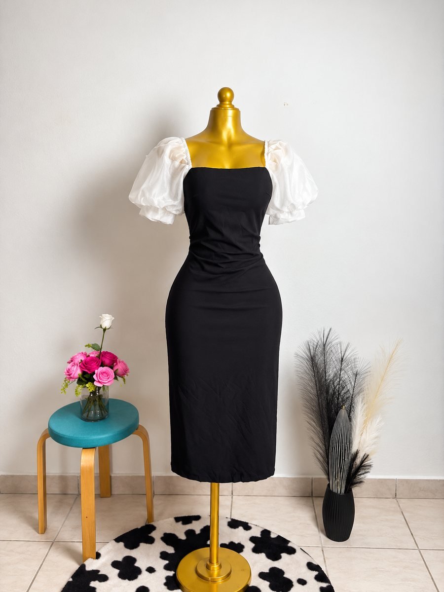Robe noire fourreau à manches bouffantes blanches